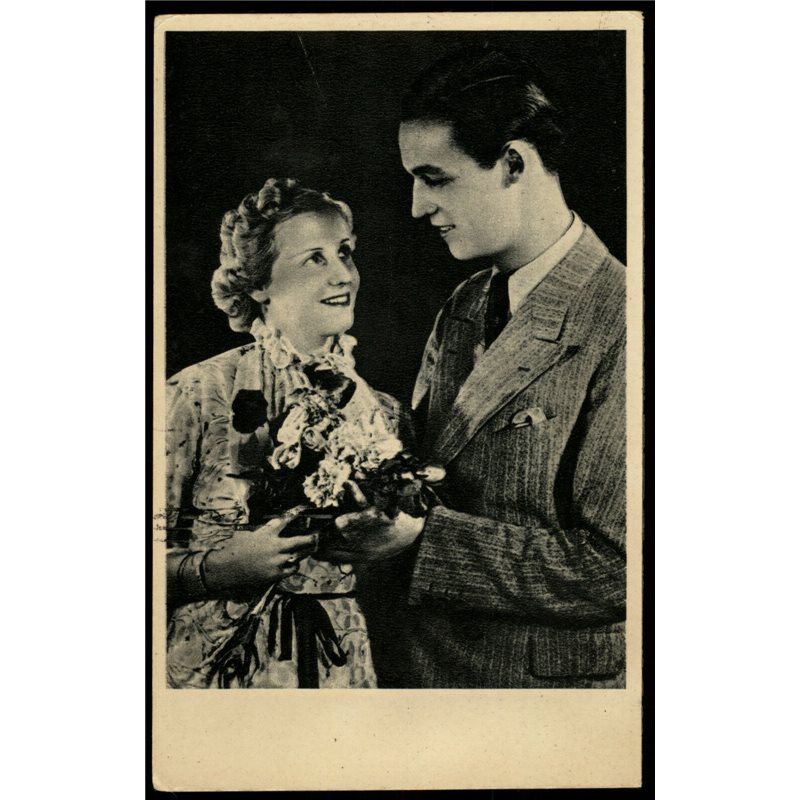 1930s Woman gets a bouquet from a Man Old Fashion Russian antique photo