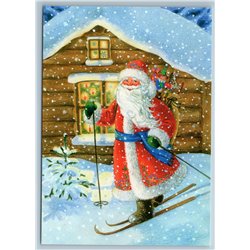 DED MOROZ Russian Santa on Skis took gift Christmas Tree by Uvarova New Postcard